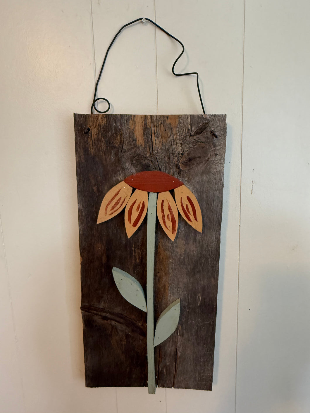 Hanging single sunflower .