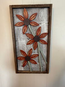 Triple sunflower on century old barnboard frame .