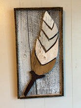 Load image into Gallery viewer, Pieces feather on framed barnboard .

