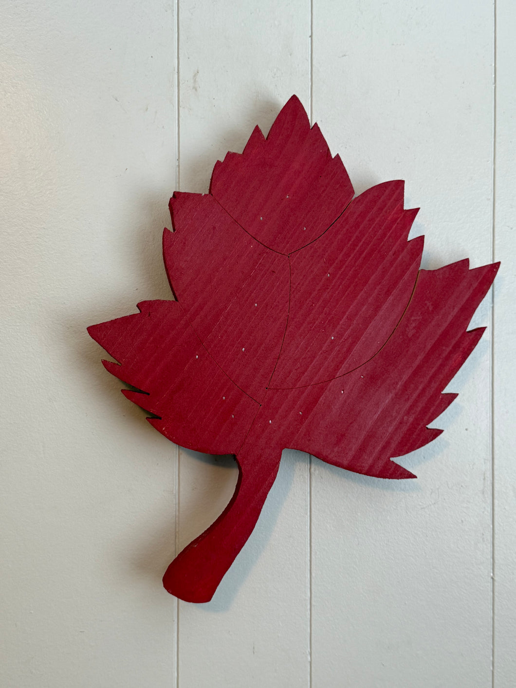 Hanging maple leaf.