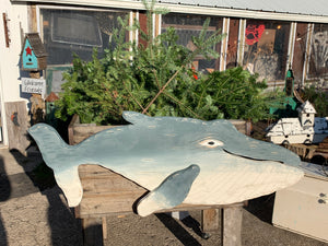 Large hand carved wooden whales