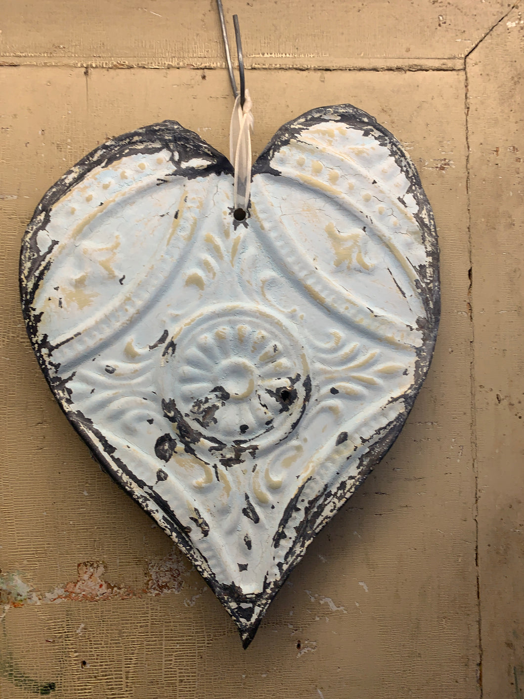 Flat antique tin hearts