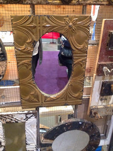 Antique embossed tin oval mirrors