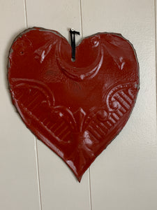 Flat antique tin hearts