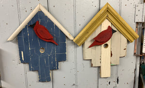Decorative birdhouse with cardinal